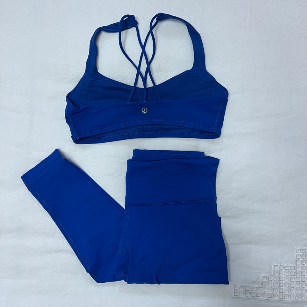 Blue Lululemon matching yoga tights and sports bra set